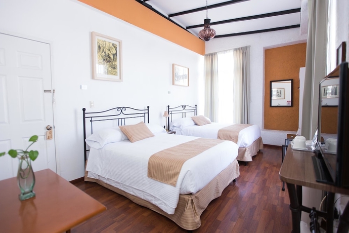 Imagen de la habitación del Hotel Portico Cultural. Foto 15