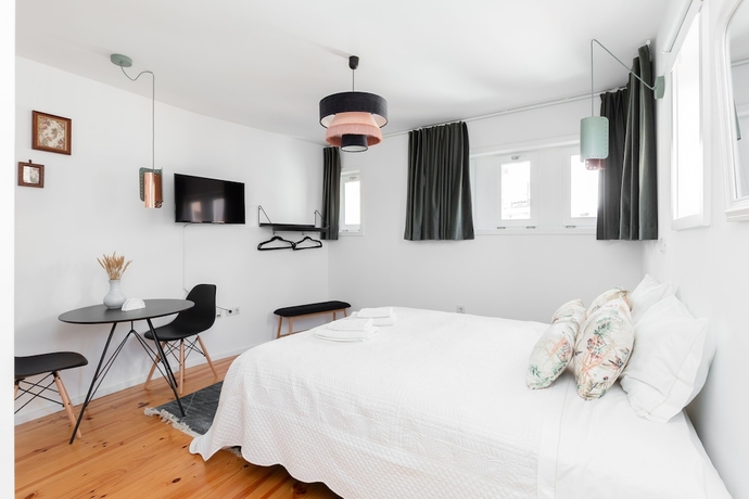 Imagen de la habitación del Hotel Porto Belomonte Studios. Foto 11