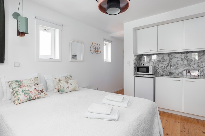 Imagen de la habitación del Hotel Porto Belomonte Studios. Foto 13
