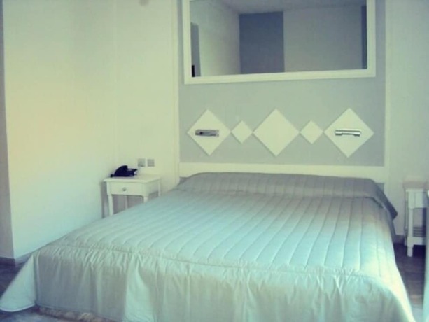 Imagen de la habitación del Hotel Porto Castello. Foto 11