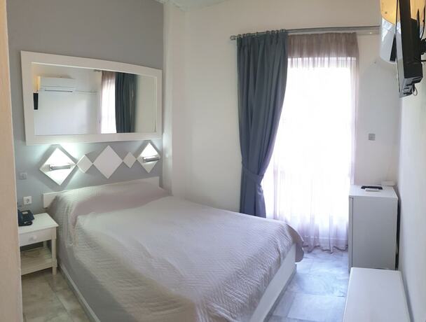 Imagen de la habitación del Hotel Porto Castello. Foto 20