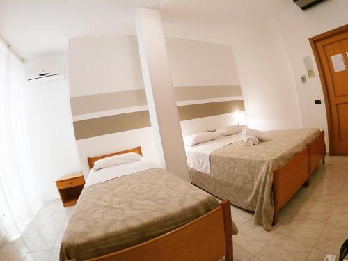 Imagen de la habitación del Hotel Porto Cesareo. Foto 8