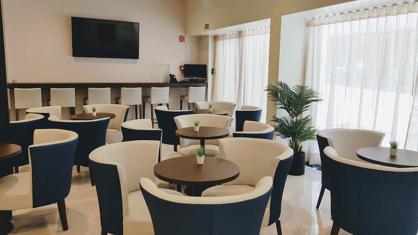 Imagen de la habitación del Hotel Porto City. Foto 18