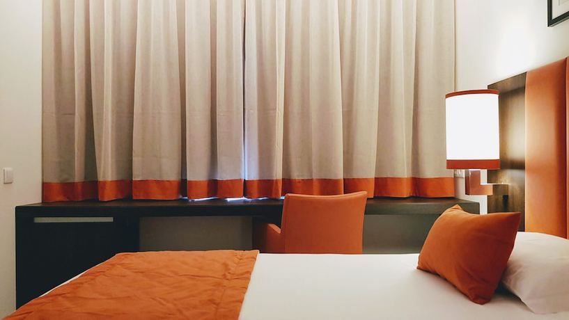 Imagen de la habitación del Hotel Porto City. Foto 19