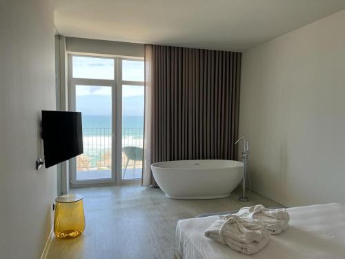 Imagen de la habitación del Hotel Porto Covo Praia Hotel and SPA. Foto 4