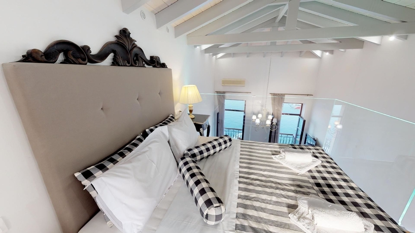 Imagen de la habitación del Hotel Porto Enetiko Suites. Foto 9