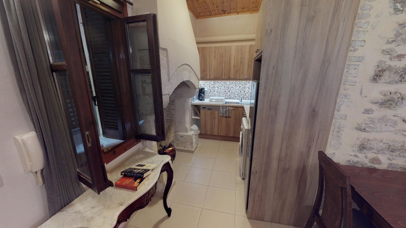 Imagen de la habitación del Hotel Porto Enetiko Suites. Foto 19