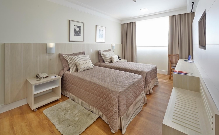 Imagen de la habitación del Hotel Porto Feliz Executive. Foto 4