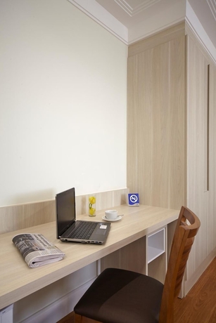 Imagen de la habitación del Hotel Porto Feliz Executive. Foto 5