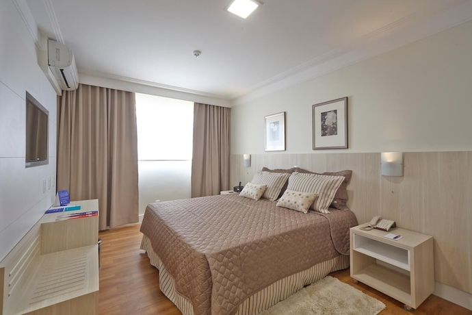 Imagen de la habitación del Hotel Porto Feliz Executive. Foto 6