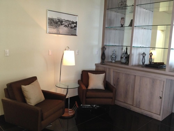 Imagen de la habitación del Hotel Porto Feliz Executive. Foto 12
