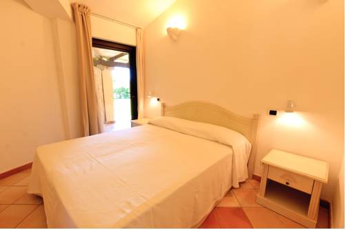 Imagen de la habitación del Hotel Porto Giunco Residence. Foto 3
