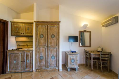 Imagen de la habitación del Hotel Porto Giunco Residence. Foto 5