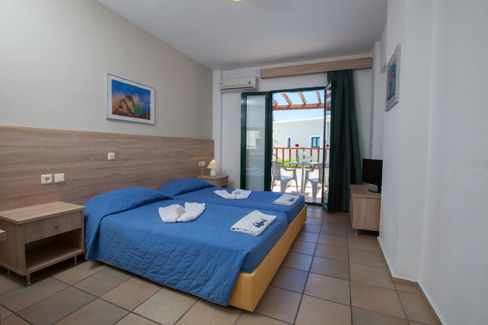 Imagen de la habitación del Hotel Porto Greco Village Beach. Foto 12