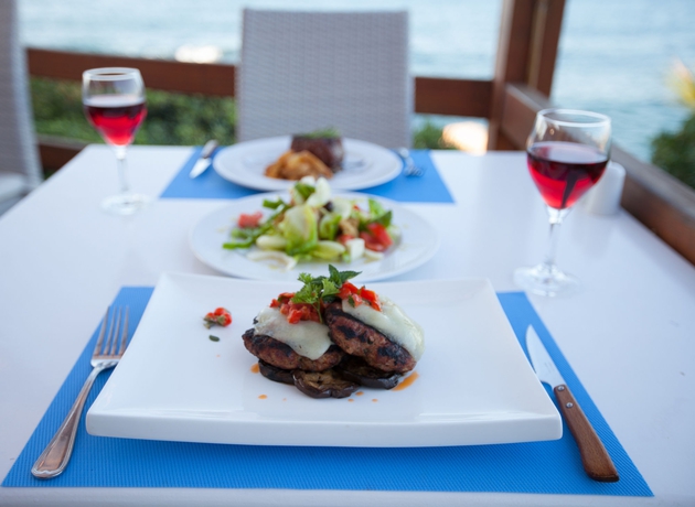 Imagen del bar/restaurante del Hotel Porto Greco Village Beach. Foto 6