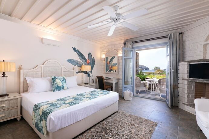 Imagen de la habitación del Hotel Porto Kea Suites. Foto 18