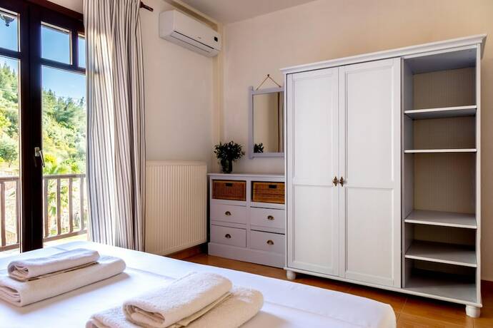 Imagen de la habitación del Hotel Porto Koufo Resort. Foto 14