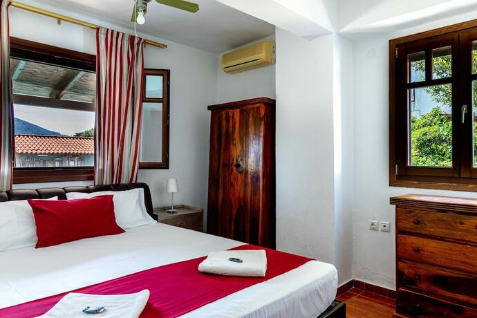 Imagen de la habitación del Hotel Porto Koufo Resort. Foto 16