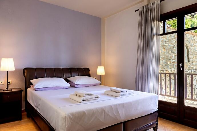 Imagen de la habitación del Hotel Porto Koufo Resort. Foto 18
