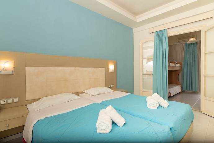 Imagen de la habitación del Hotel Porto Koukla Beach. Foto 5