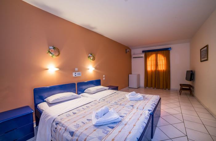 Imagen de la habitación del Hotel Porto Koukla Beach. Foto 10