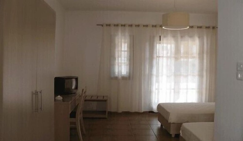 Imagen de la habitación del Hotel Porto Merika. Foto 15