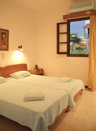 Imagen de la habitación del Hotel Porto Merika. Foto 18