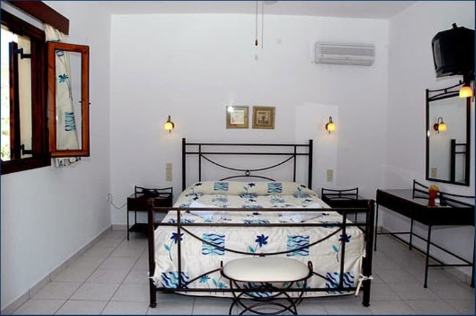 Imagen de la habitación del Hotel Porto Merika. Foto 19