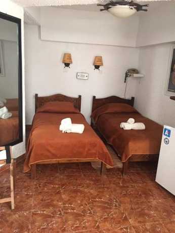 Imagen de la habitación del Hotel Porto Perissa. Foto 6