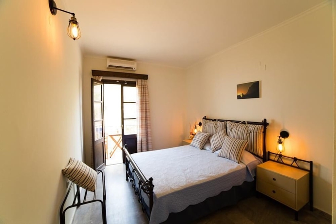 Imagen de la habitación del Hotel Porto Potha. Foto 12
