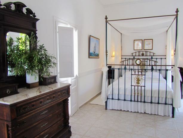 Imagen de la habitación del Hotel Porto Scoutari Romantic. Foto 5
