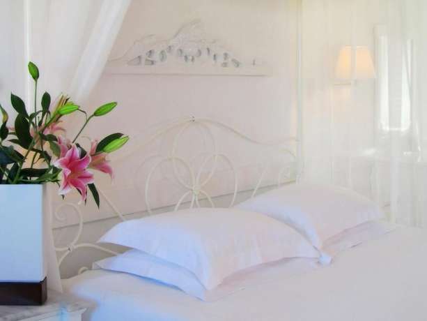 Imagen de la habitación del Hotel Porto Scoutari Romantic. Foto 13