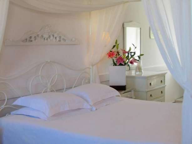 Imagen de la habitación del Hotel Porto Scoutari Romantic. Foto 14