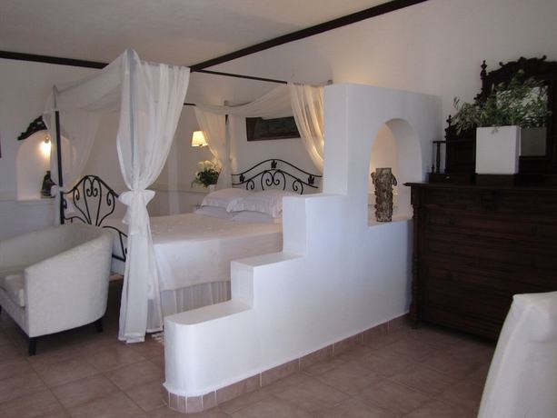 Imagen de la habitación del Hotel Porto Scoutari Romantic. Foto 15