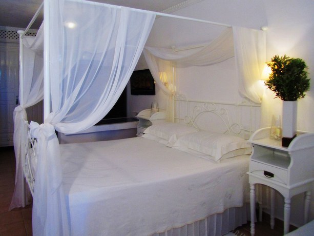 Imagen de la habitación del Hotel Porto Scoutari Romantic. Foto 16