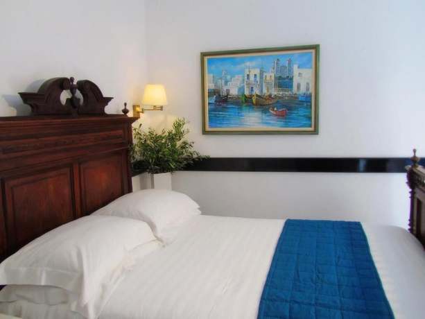 Imagen de la habitación del Hotel Porto Scoutari Romantic. Foto 19
