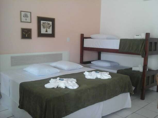 Imagen de la habitación del Hotel PortoSol Pousada. Foto 15