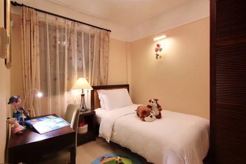 Imagen de la habitación del Hotel Portofino International Apartment. Foto 5