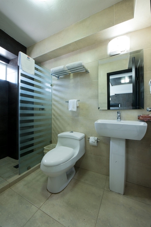 Imagen de la habitación del Hotel Portonovo Plaza Malecón. Foto 10