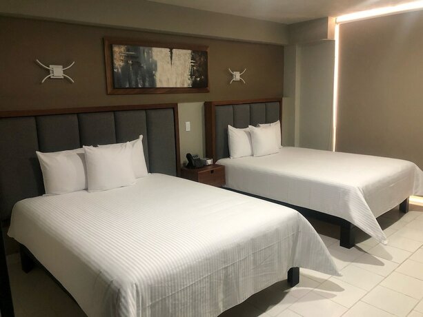 Imagen de la habitación del Hotel Portozul. Foto 6
