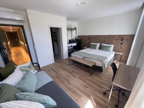 Imagen de la habitación del Hotel Portucalense. Foto 19