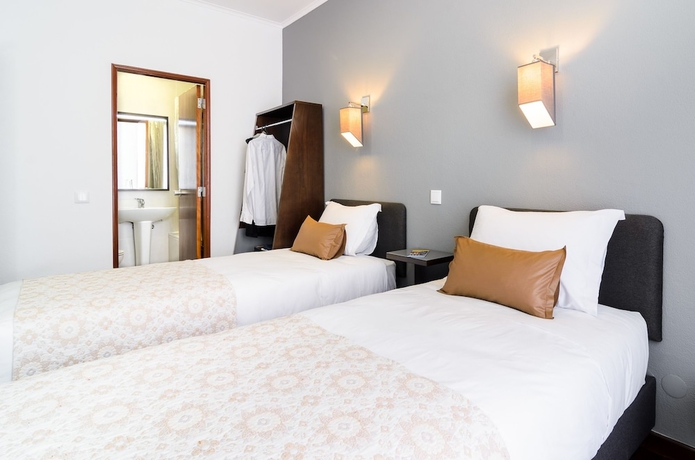 Imagen de la habitación del Hotel Portuense Lisboa. Foto 12