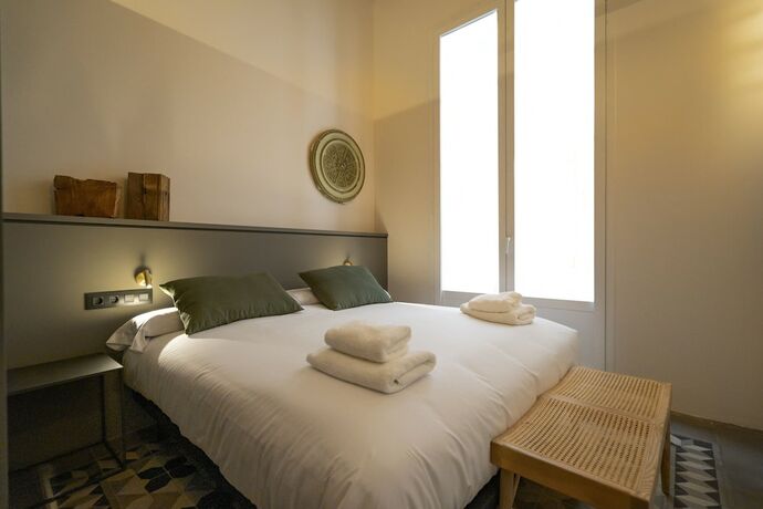 Imagen de la habitación del Hotel Porxos Garden. Foto 19