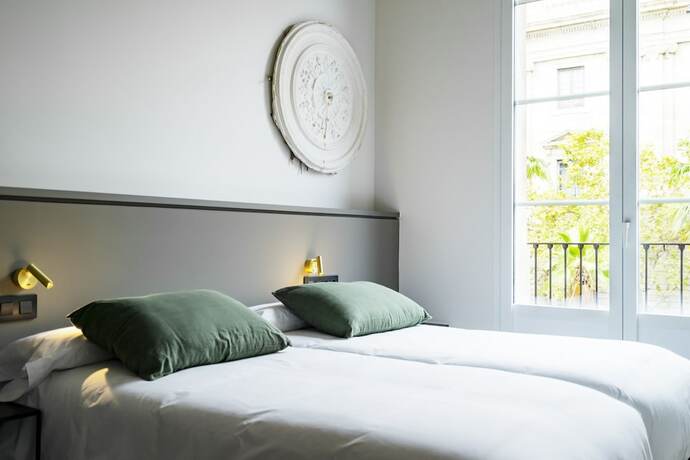 Imagen de la habitación del Hotel Porxos Garden. Foto 20