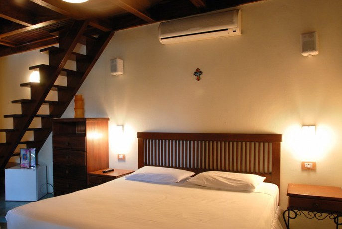 Imagen de la habitación del Hotel Posada Acquamarina. Foto 4