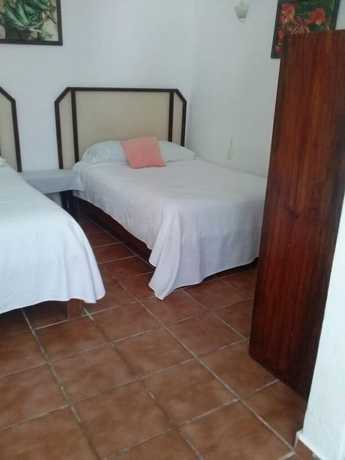 Imagen de la habitación del Hotel Posada Amor Boutique. Foto 6