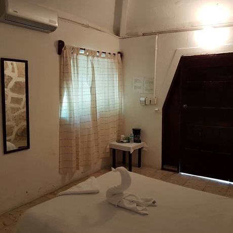 Imagen de la habitación del Hotel Posada Amor Boutique. Foto 10