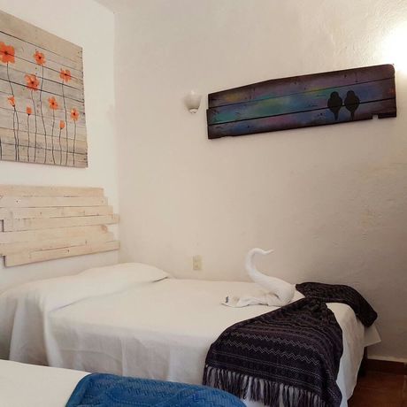 Imagen de la habitación del Hotel Posada Amor Boutique. Foto 16