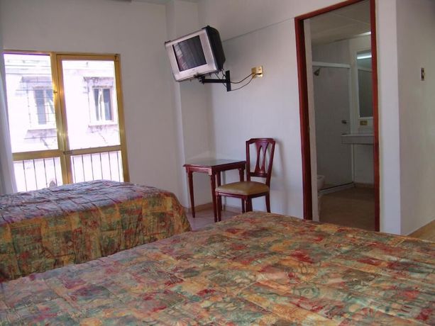 Imagen de la habitación del Hotel Posada Arcos. Foto 11