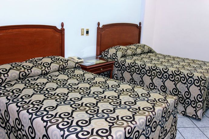 Imagen de la habitación del Hotel Posada Arcos. Foto 14